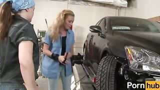 Two lesbians have fun with each other in the garage, engaging in intense pussy licking
