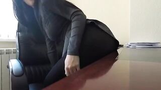 Mini Diva risks exposure in the office while indulging in solo play