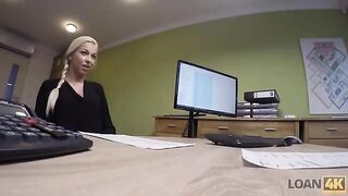 The woman entrepreneur needs money, so she turns to the loan agent for help