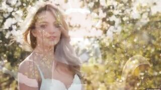 A glamorous girl is calling nature to herself on a terrace in HD