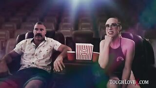 The girl is alone in the cinema, she's playing with herself