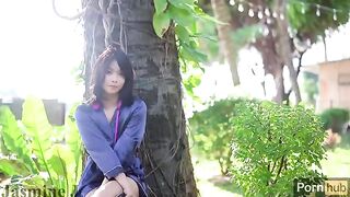 A cute Asian girl pees and masturbates in the garden