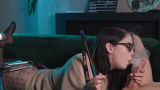 Nerdy girl with glasses smokes and sucks cock while getting fucked in 69 position