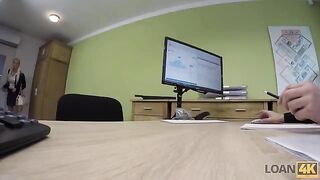 Business lady gets a loan from the bank for some money