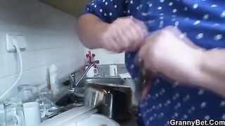 Older blonde makes love with younger guy in a steamy scene
