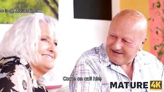 A guy fucked a mature woman on the table in front of her husband