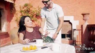 A busty brunette enjoys a passionate holiday fling with a well-endowed man