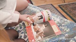 Lesbians study Kama Sutra before enjoying each other’s company