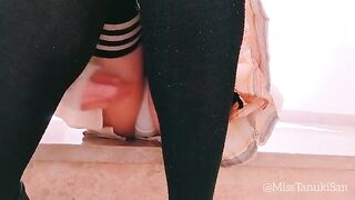 A schoolgirl with no panties masturbates at her desk and squirts