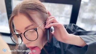 A hot slut talks on the phone with her husband while her friend fucks her hard
