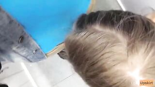 Petite schoolgirl risks getting caught for a public blowjob in a changing room