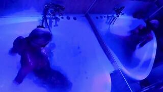 A blonde woman with sex toys in the bathroom, showcasing her wild side