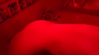 A blonde woman with sex toys in the bathroom, showcasing her wild side