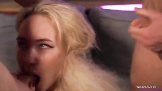 The blonde has two cocks in her mouth and sucks them both very well