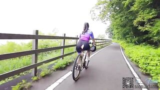 A couple enjoys cycling and gets intimate outdoors
