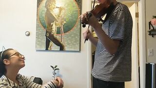 Girl tries to practice violin but is interrupted by her passionate boyfriend