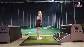 A hot blonde is having fun with her boyfriend on a golf date