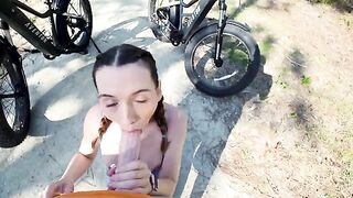 Petite cyclist gives the tourist a passionate bike tour