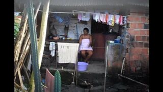 A black woman did not know that there was a hidden camera in the room