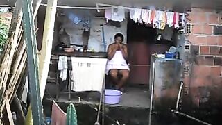 A black woman did not know that there was a hidden camera in the room