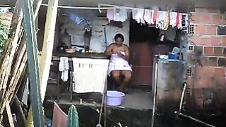 A black woman did not know that there was a hidden camera in the room