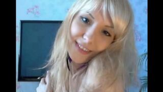 The blonde caresses her fingers with her smooth pussy in a hot masturbation session