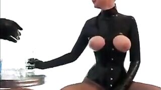 A group of lesbians in latex were very excited and passionate with each other