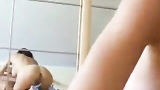 A couple gets together for a private, passionate session at home