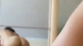 A couple gets together for a private, passionate session at home