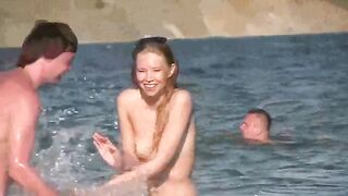A hot mature sunbathes naked on the beach in stunning HD