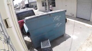 The couple engaged in sex behind the garbage tank, unaware of being watched