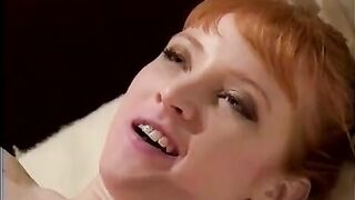 Two hot lesbian nurses in stockings and pantyhose have fun with a strap-on dildo