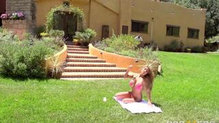 A blonde is fucking on the lawn and she loves it very much