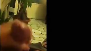 Finger her pussy on the couch while removing orange underwear