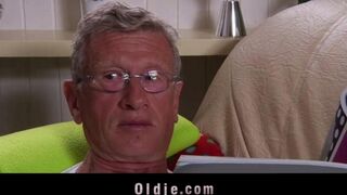 The old man is fucking with a hot young blonde on the couch