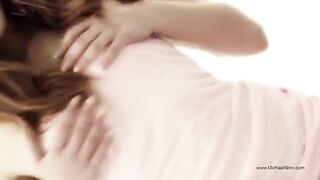 A young and beautiful woman plays with her body and gets fucked by herself