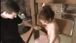 A sexy girl in bondage is having rough sex with a man