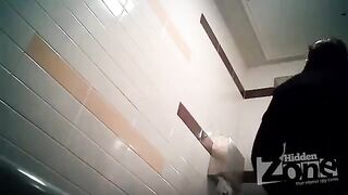 A camera was secretly placed in the toilet bowl, and a girl came in