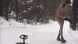 Naked beauties have fun with snowballs in the winter on the street