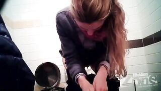 A girl pees in the shop and notices a camera - scandal!