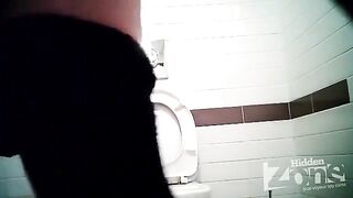 A girl pees in the shop and notices a camera - scandal!