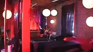 Black woman in a latex suit vigorously jumped on the member, showcasing intense passion