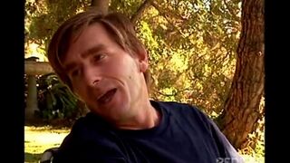 A cute girl is fucking with a guy outdoors