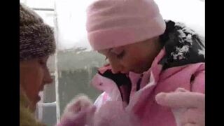 Two girls are having fun on a cold winter day in a steamy session