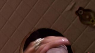 A beauty got a dick in her mouth through a hole in the toilet