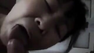 The Chinese woman practices her skills with a man on the bed