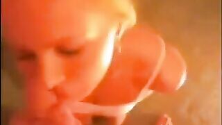 A blowjob at home turns into a cumshot on the face, showcasing raw passion