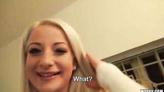 A sexy blonde with huge natural tits in a private scene