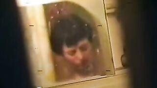 A drunken woman was having fun in the bath with a young soldier