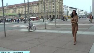 A naked girl walks the streets of the city and gets fucked by a stranger